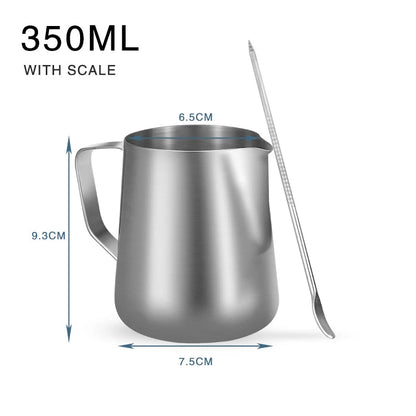 Stainless steel milk pitcher with measurements and a spoon on a white background