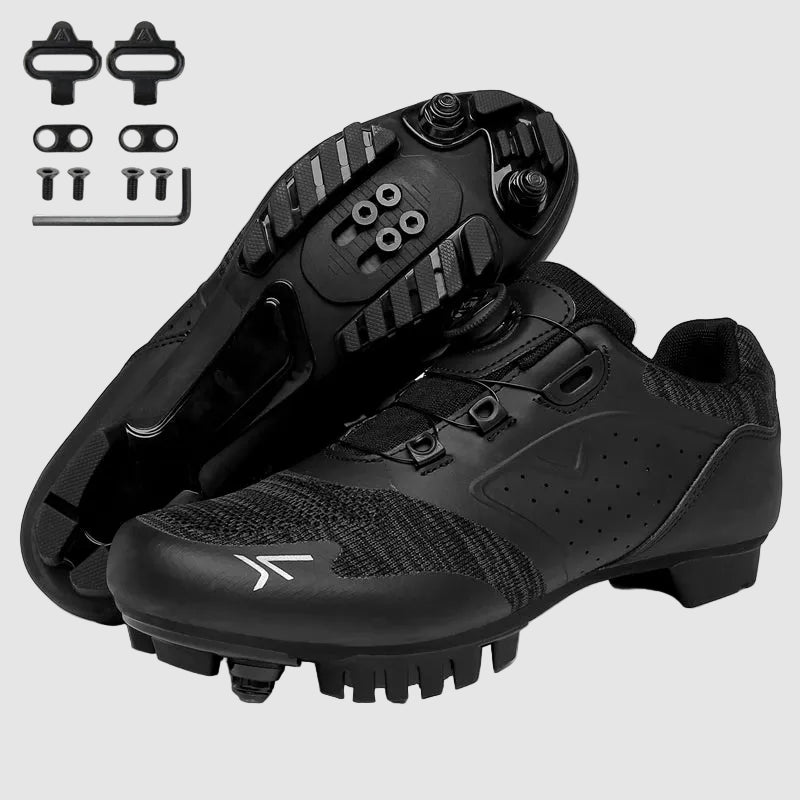 Black cycling shoes with cleats and hardware on a white background