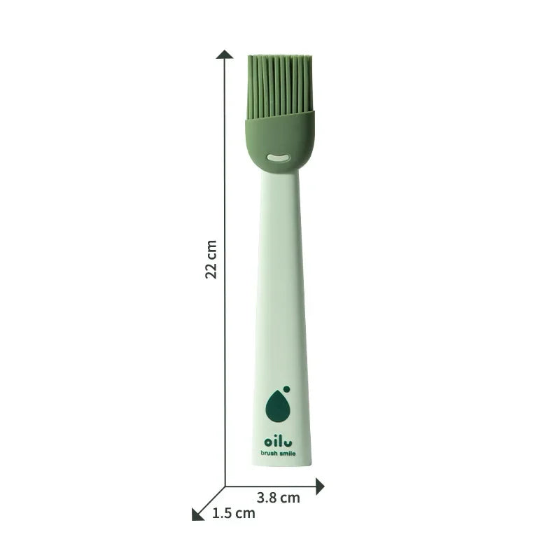 Green brush with measurements on a white background