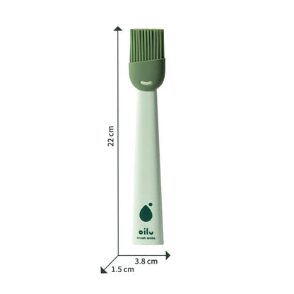 Green brush with measurements on a white background