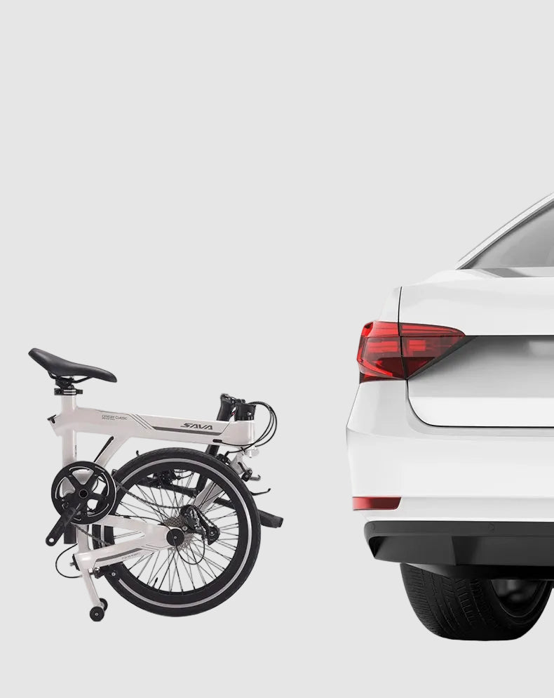 Foldable bicycle next to a car with text about its ease of use for travel.