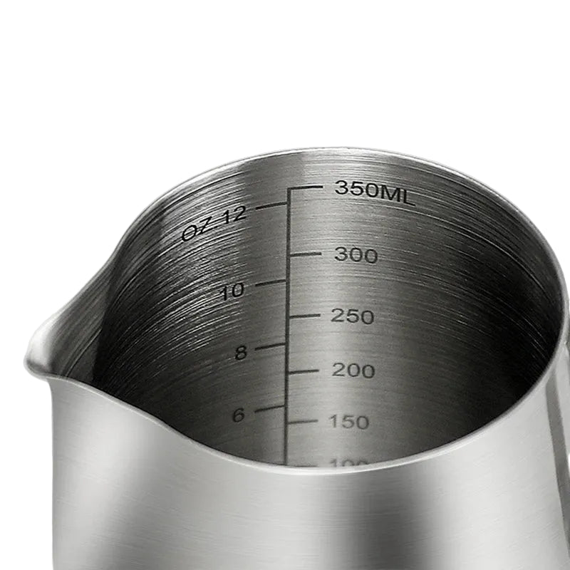 Stainless steel measuring cup with volume markings on a white background