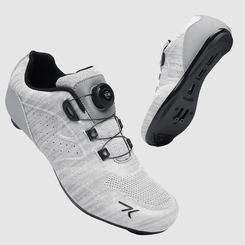 Gray cycling shoes with black accents on a white background
