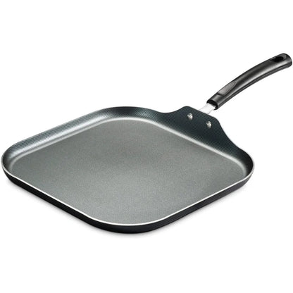 Black square grill pan with handle on a white background
