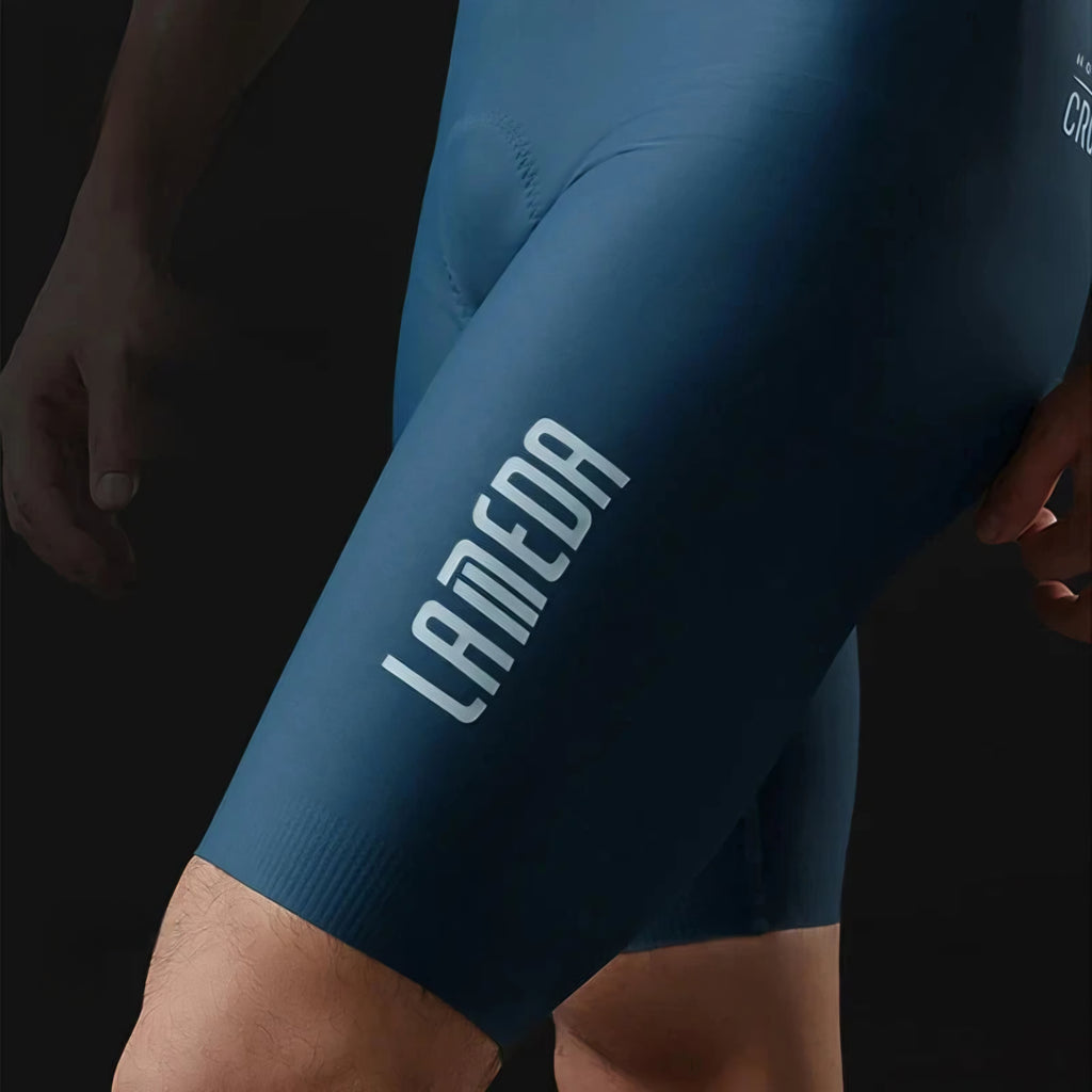 Blue athletic shorts with 'Lamego' branding on a black background